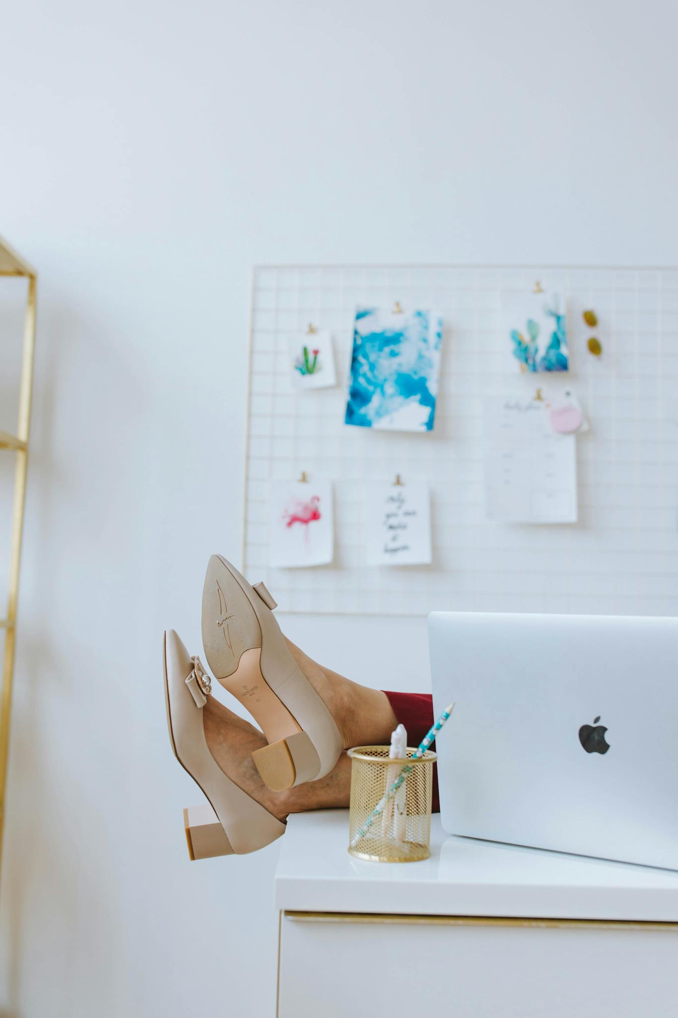 Cozy home office scene with feet up, showcasing relaxation and productivity.